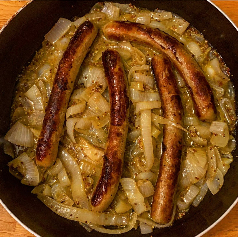 Bratwurst in beer with onions and mustard – Watts Farms