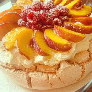 Peach and raspberry Pavlova