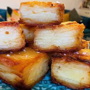 Crispy layered potatoes in goose fat