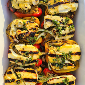 Couscous Stuffed Red and Yellow Bell Peppers, Topped with Halloumi and Thyme